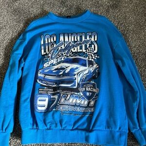 Car crewneck sweatshirt. It’s in great condition. Very comfy. Could be oversized